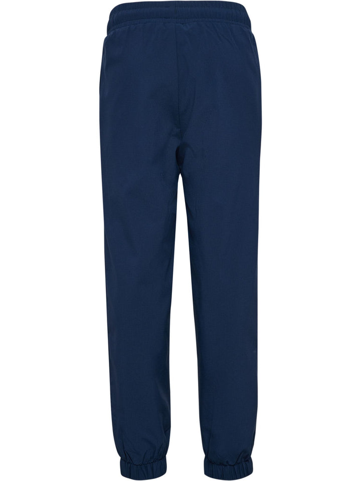 Hummel Hmljr Loose Tracksuit Pants - dress blues